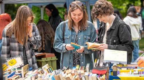 Visitors looking at books at the Birmingham Book Extravaganza
